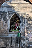 Old Bagan Myanmar. The Tharaba Gateway, shrine containing images of nats. 